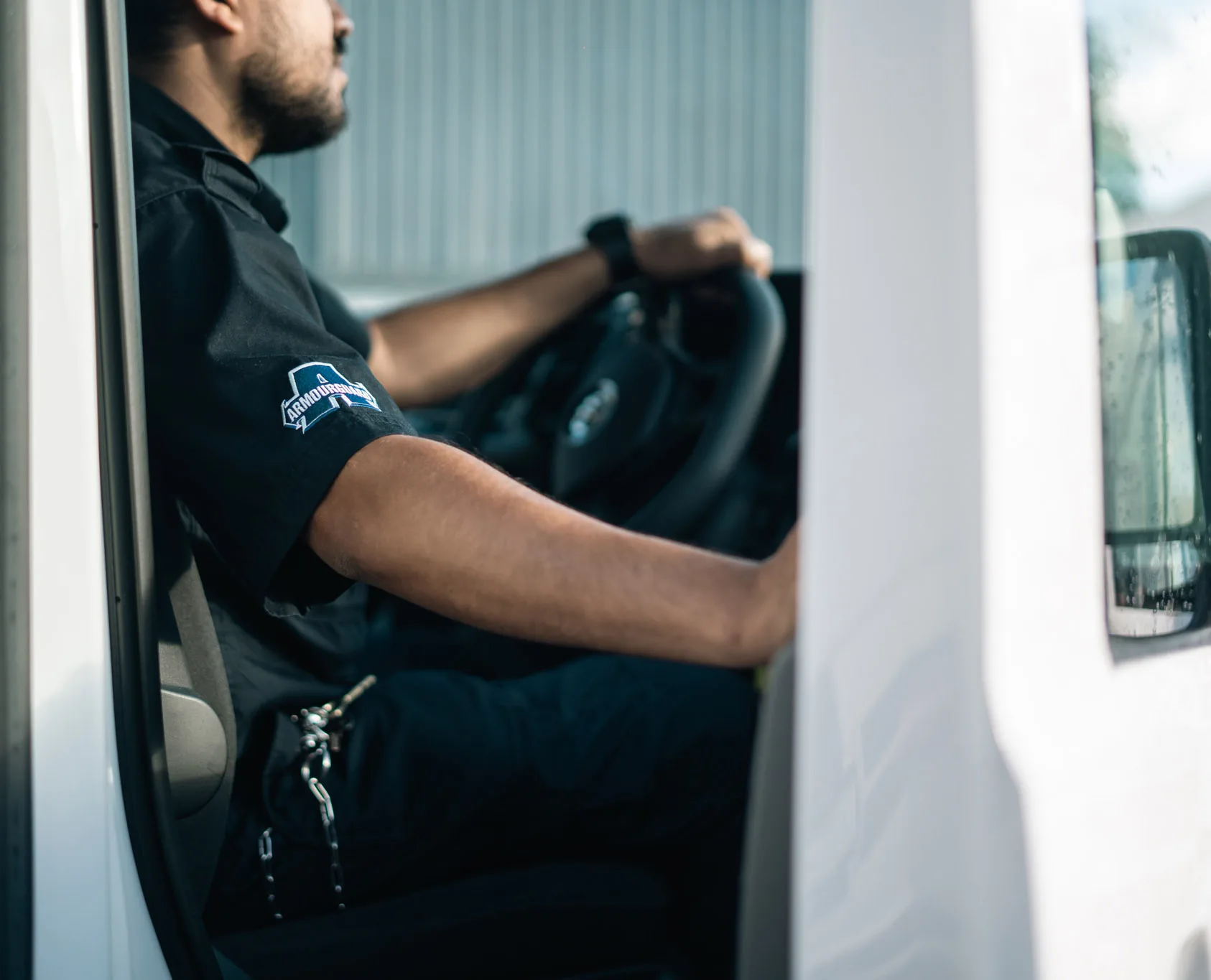 Armourguard driver opening van door