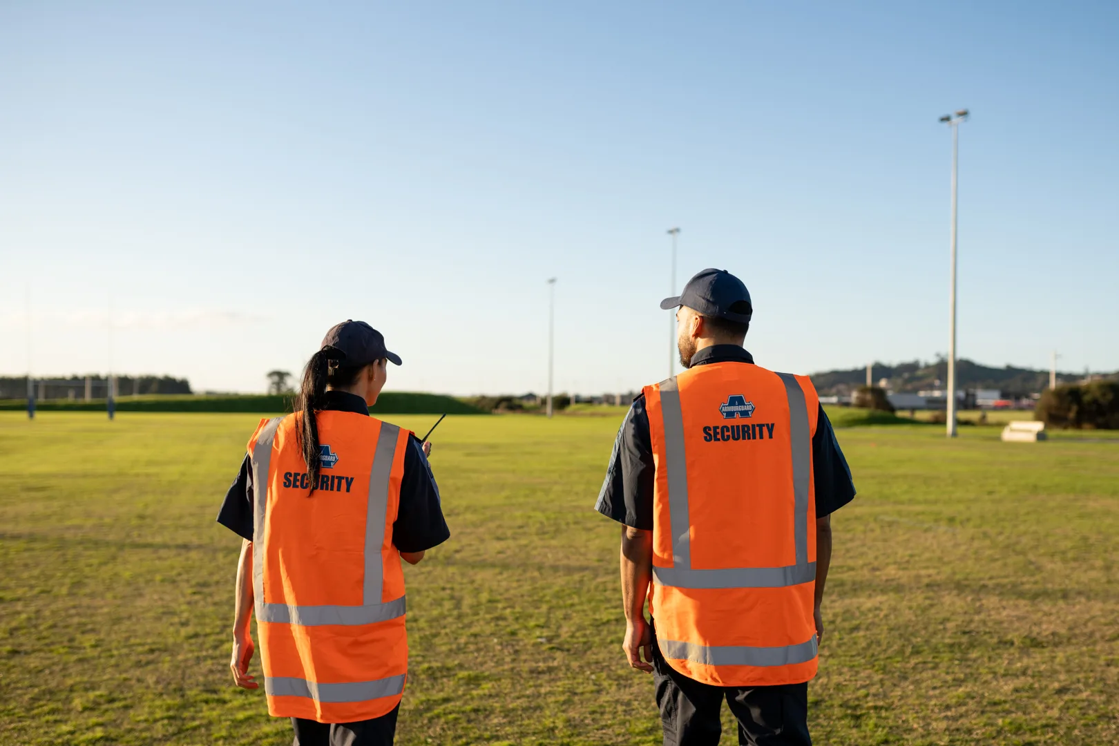 Mobile security guards in high-viz vests