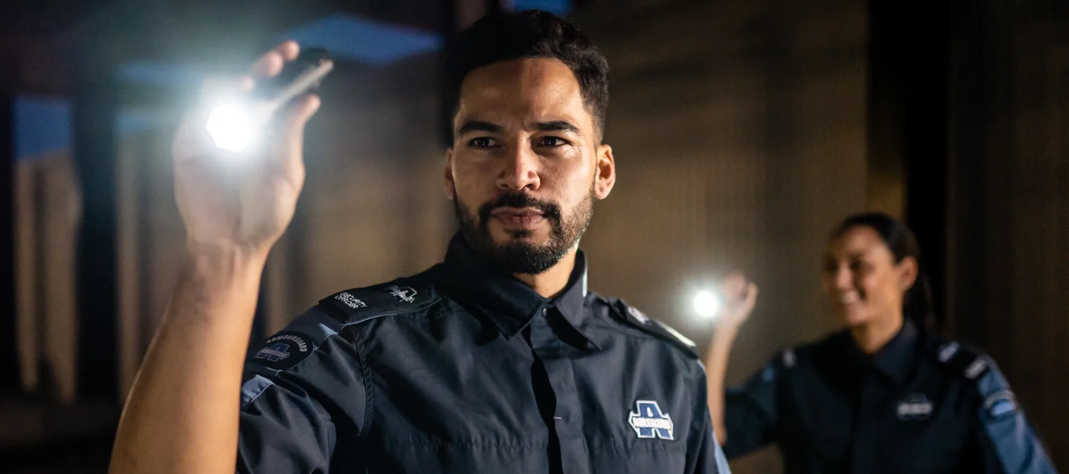 Mobile security guards checking property.